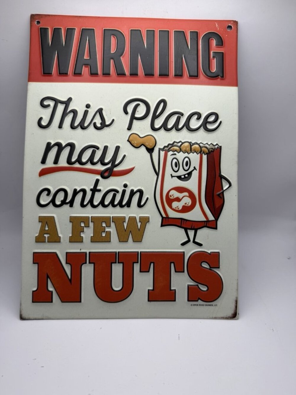Might Be A Little Nuts Tin Sign